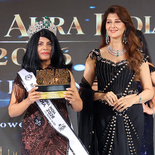 Mangala Patil receiving her crown and trophy as 1st Runner-Up – Mrs Dream Aura India G2 2026 at the AK Pageant Grand Finale.