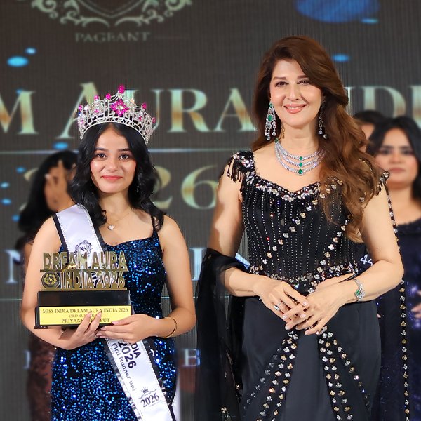 Priyanshi Rajput wearing her crown and sash while holding her trophy as the 3rd Runner-Up in Miss Dream Aura India 2026.
