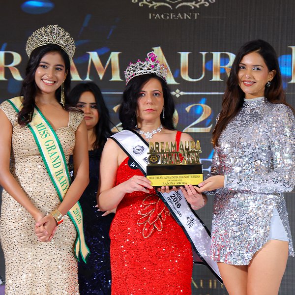 Arora receiving her crown and trophy as North India Winner – Mrs Dream Aura India G2 2026 at the AK Pageant Grand Finale.