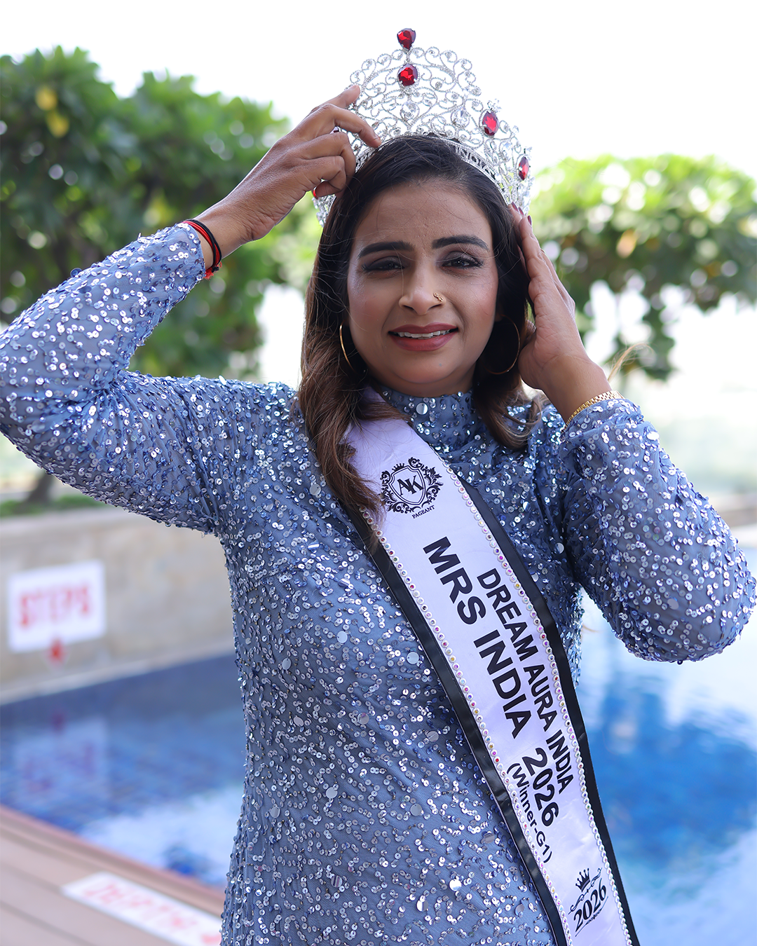 Shakila Ahmed wearing her Mrs Dream Aura India 2026 crown and sash